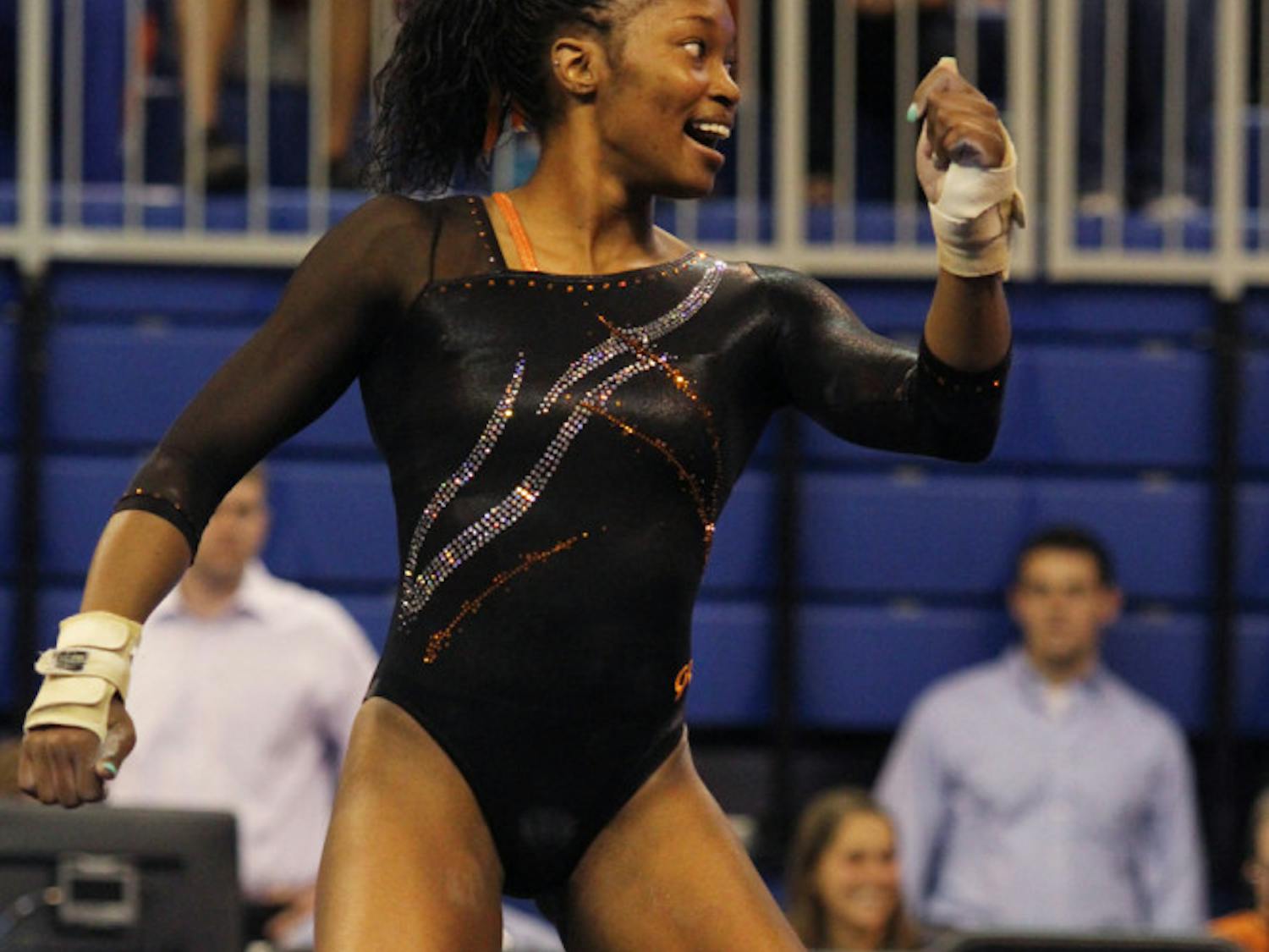 Ashanee Dickerson performs her floor routine in Florida’s 196.975-196.075 win against Kentucky on Feb. 22 in the O’Connell Center. Dickerson slipped on the balance beam in Florida's first event at the NCAA Super Six, but scored a 9.9 on the floor.