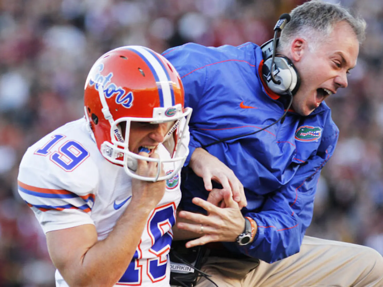 Kicker Caleb Sturgis (19) celebrates with former special teams and current defensive coordinator DJ Durkin during Florida’s 37-26 win against Florida State on Nov. 24 in Tallahassee.