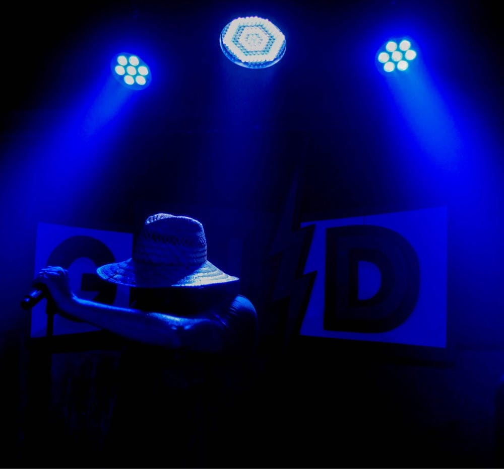 Demun Jones takes a moment to rest between songs while performing at High Dive in downtown Gainesville on July 20, 2018.