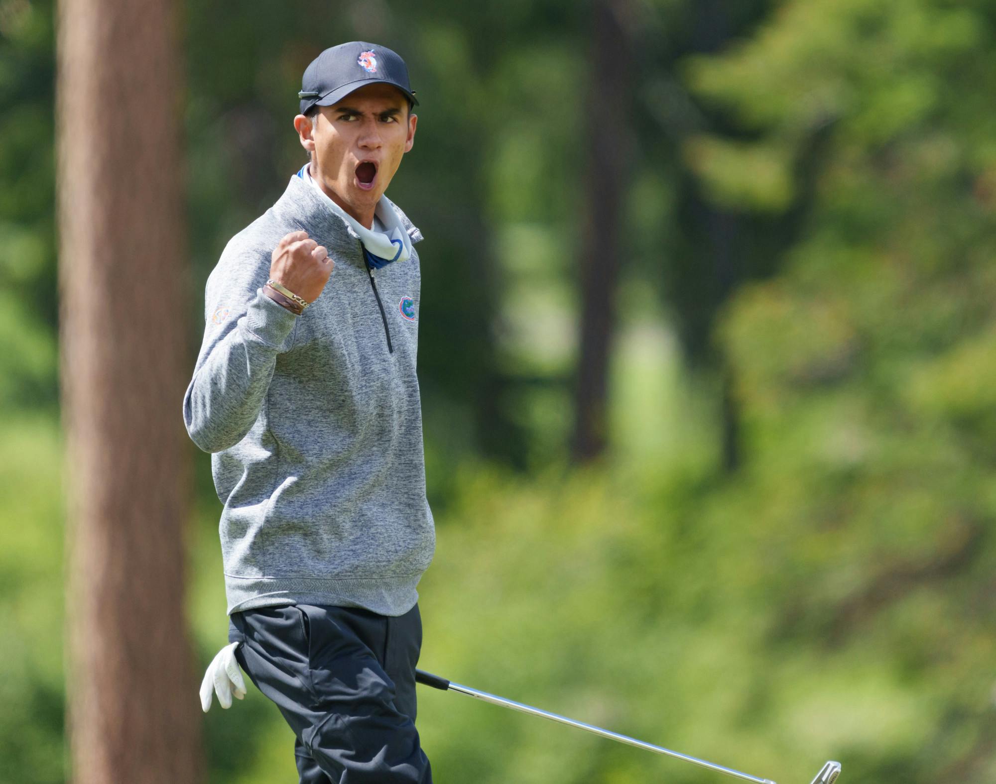 Florida's Ricky Castillo celebrates a putt  in the first round of the 2021 NCAA  Cle Elum Regional at Tumble Creek Golf Club in Cle Elum, Wash., on May 19, 2021. (Photography by Stephen Brashear/Red Box Pictures)