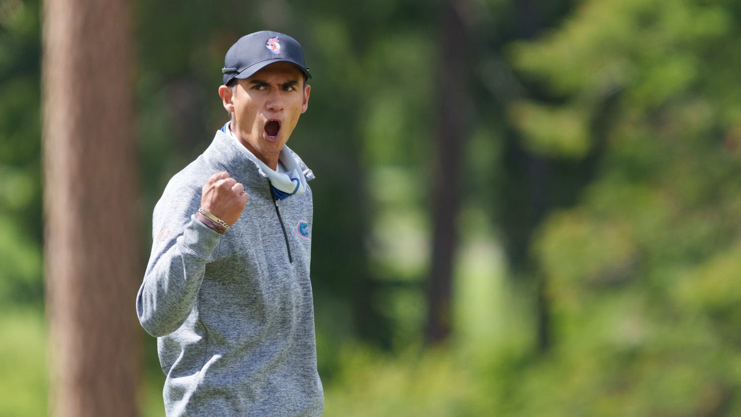 Florida's Ricky Castillo celebrates a putt in the first round of the 2021 NCAA Cle Elum Regional at Tumble Creek Golf Club in Cle Elum, Wash., on May 19, 2021. (Photography by Stephen Brashear/Red Box Pictures)