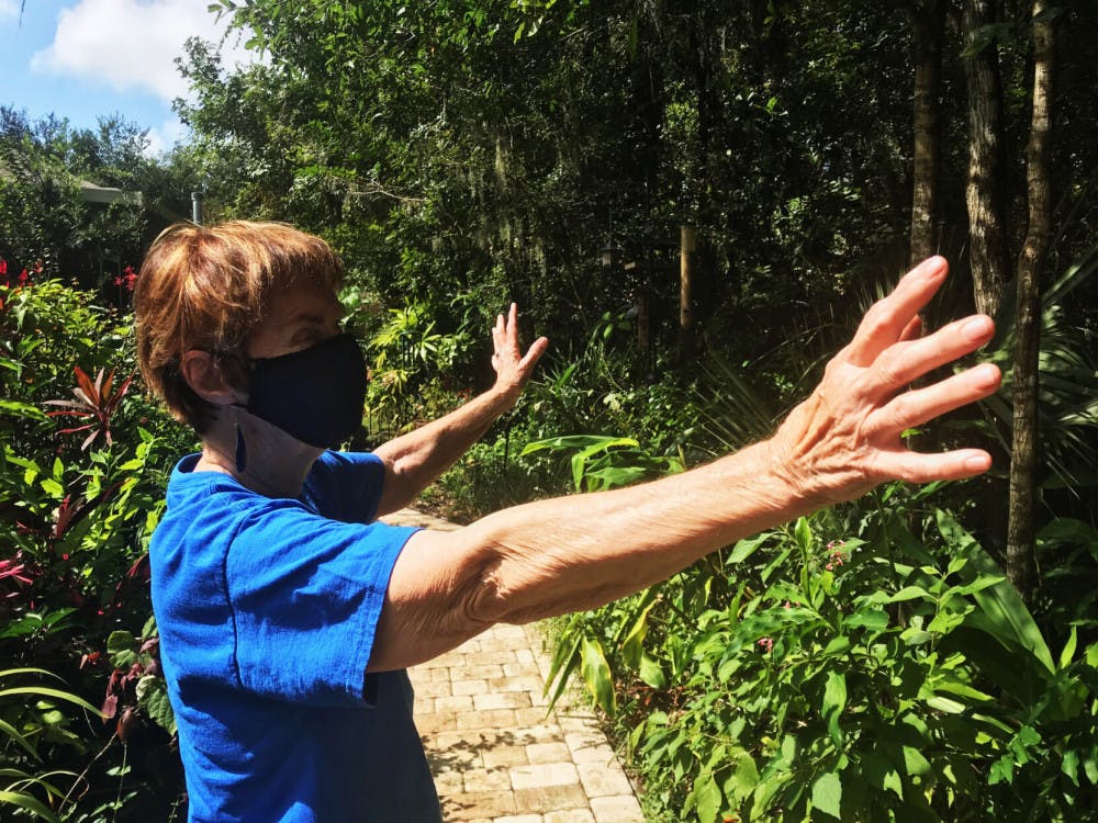 Patsy Nelms, an 83-year-old resident of Oak Hammock, is seen on Sunday, Oct. 11, 2020.&nbsp;Patsy and Warren opted to live in a house surrounded by a lush garden where purple flowers dangle from trees and hummingbirds whiz about.