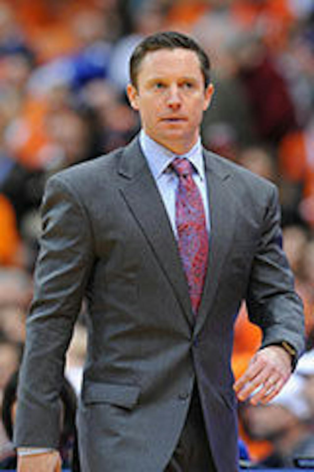 <p>Michael White, 38, was hired by the University of Florida to be the next head coach of the Gators men's basketball team, athletics director Jeremy Foley announced Thursday. White replaces former coach Billy Donovan, who left UF after 19 seasons to become the new head coach of the NBA's Oklahoma City Thunder.&nbsp;</p>
