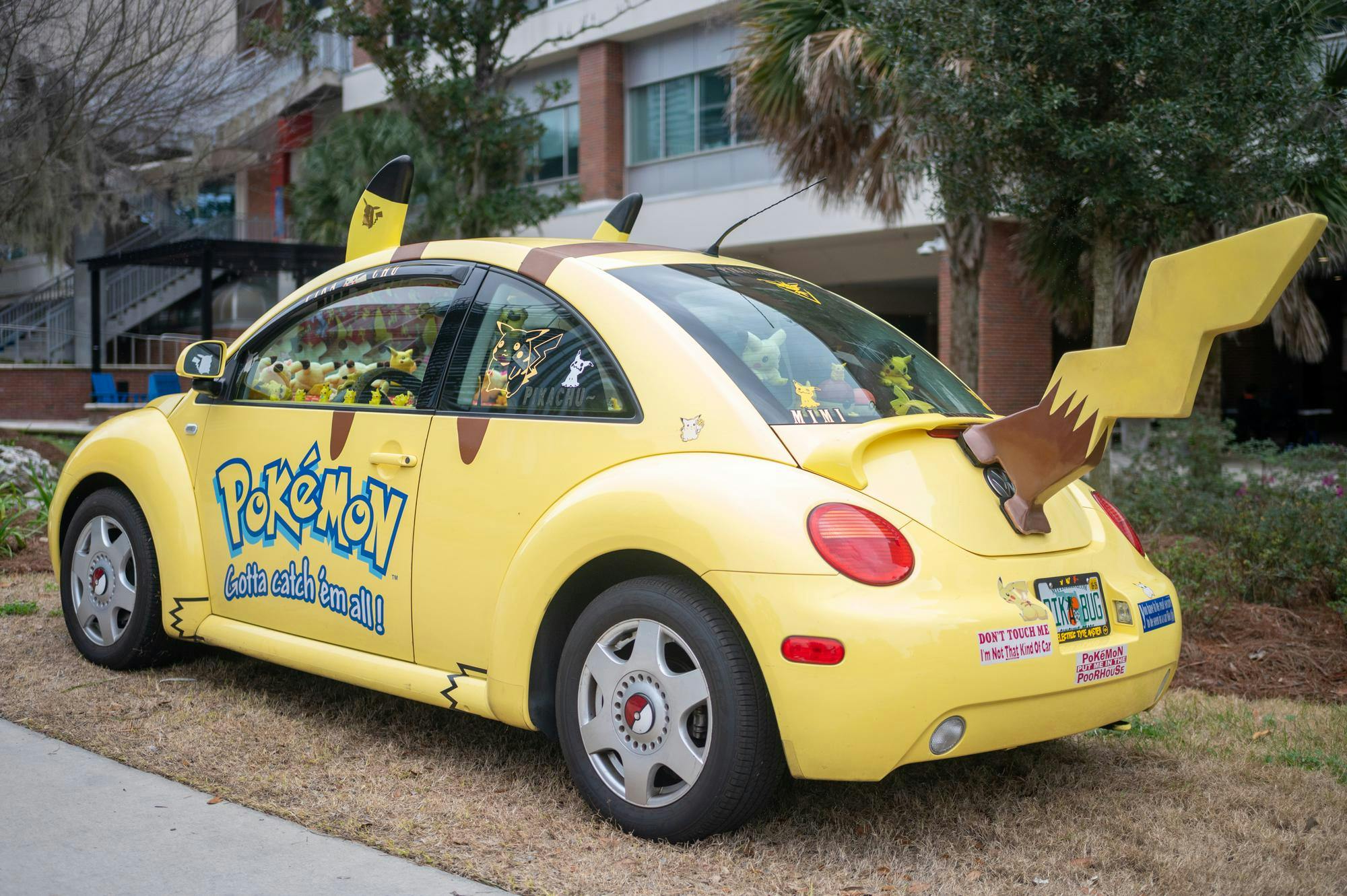 A yellow Volkswagen Beetle sits parked at the base of the Reitz Union, appearing as Pikachu, a character from the Pokemon franchise, Saturday, Feb. 28, 2026, in Gainesville, Fla.