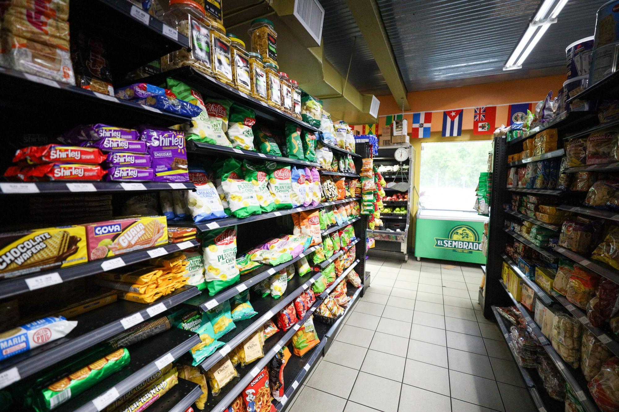A view down an aisle at La Aurora Latin Supermarket on Sunday, April 6, 2025.