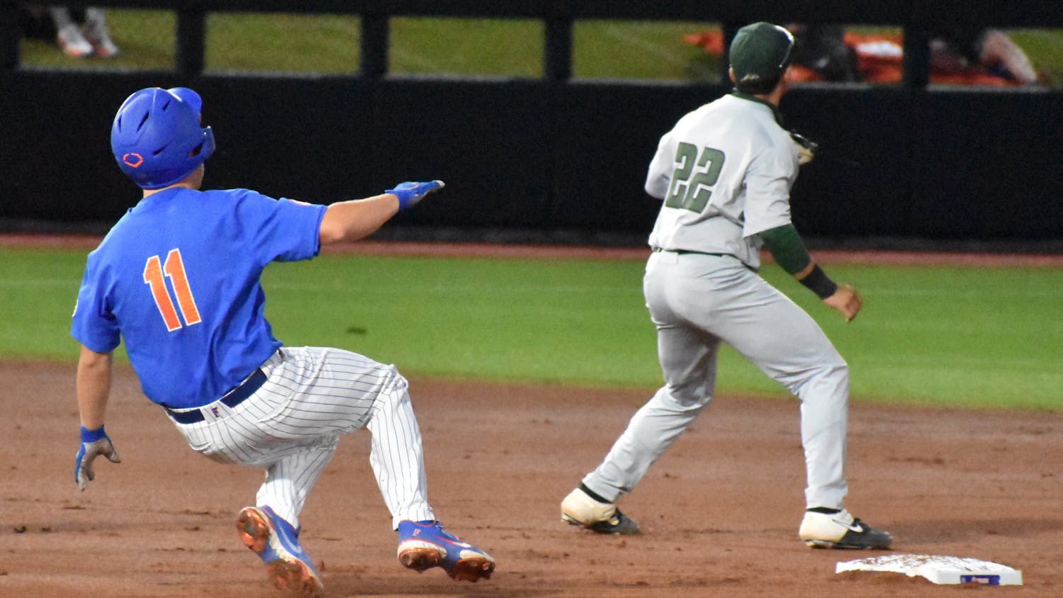 Florida catcher Nathan Hickey slides into second base March 13 against Jacksonville University. Florida takes on USF Friday in the first round of the NCAA Regional.