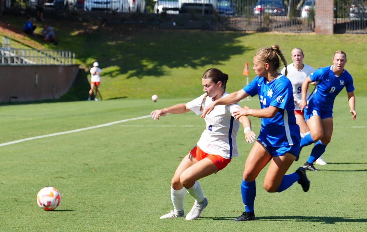 Freshman forward Megan Hinnenkamp dribbles around a Kentucky defender in the Gators' 1-1 draw against the Kentucky Wildcats on Sunday, Sept. 24, 2023.