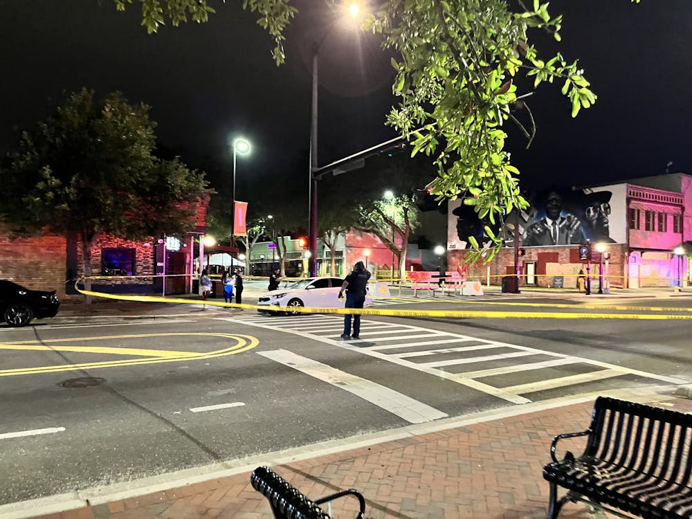 <p>Caution tape lines the streets in downtown Gainesville early Monday morning, April 10, 2023. ﻿</p>