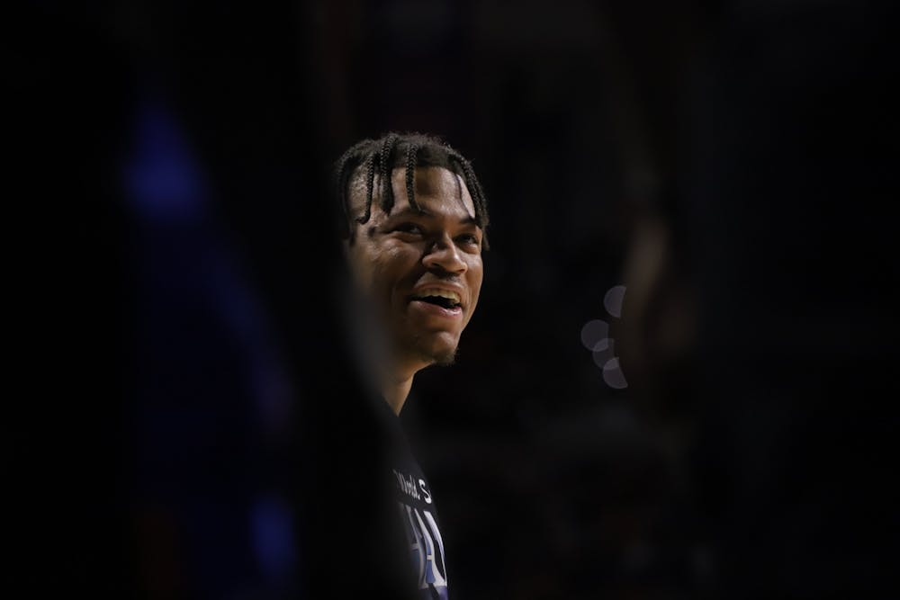 <p>Keyontae Johnson during a Florida huddle Feb. 19. The senior was is under investigation for a sexual assault, reportedly taking place in February. </p>