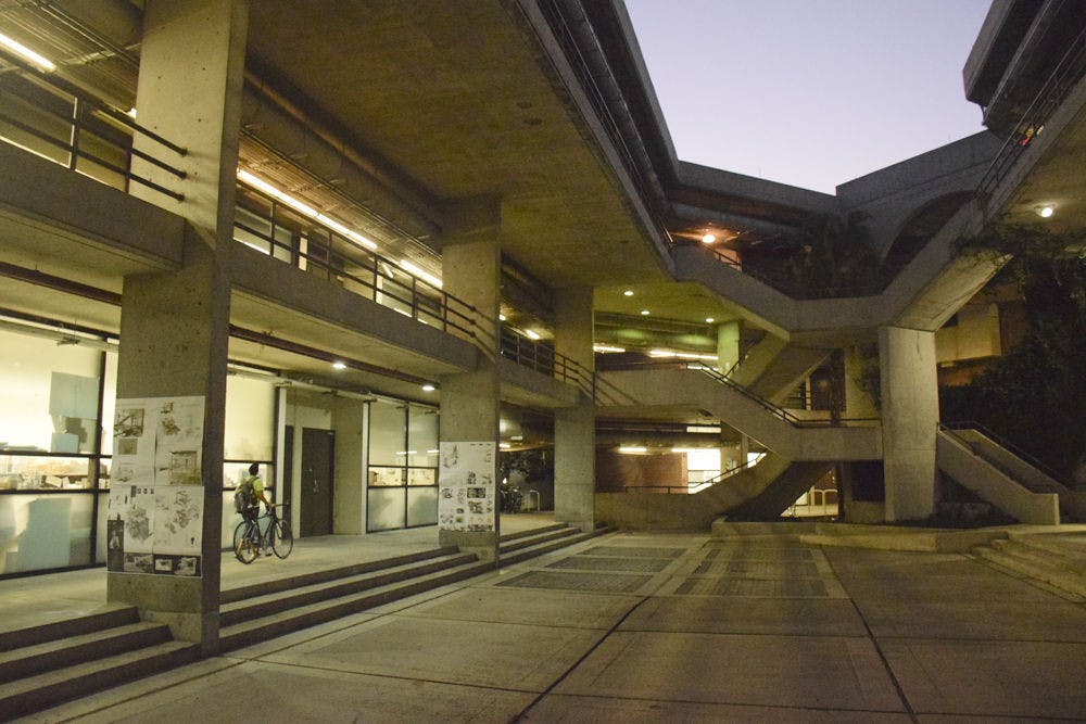 Nathalie Canate, a 19-year-old UF architecture sophomore, walks to her Design 3 class in the architecture building Nov. 4, 2015. This week the UF College of Design, Construction and Planning, located in the architecture building, celebrates its 90th birthday.