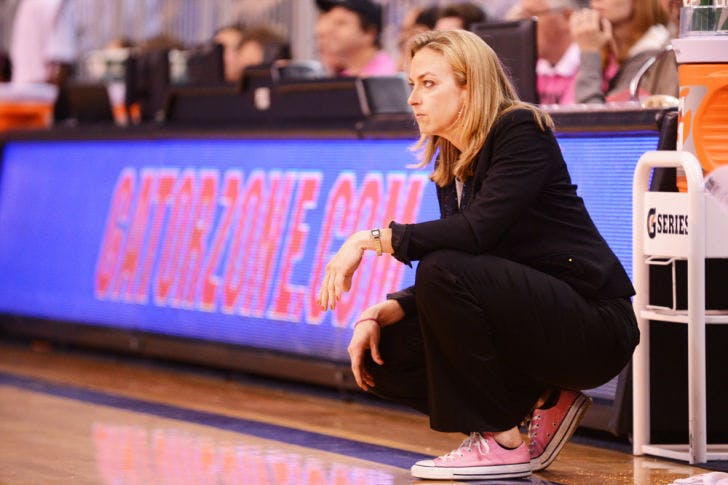 Coach Amanda Butler watches during Florida’s 87-54 victory against Alabama on Feb. 3 in the O’Connell Center. UF advanced to the WNIT Elite Eight after defeating Charlotte, the school Butler left to take over as the Gators’ coach in 2007.
