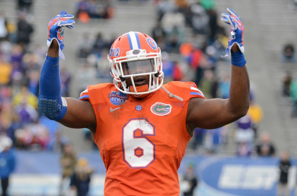 <p>Dante Fowler Jr hypes up the crowd during Florida's 28-20 win in the Birmingham Bowl against East Carolina on Jan. 3 at Legion Field.</p>