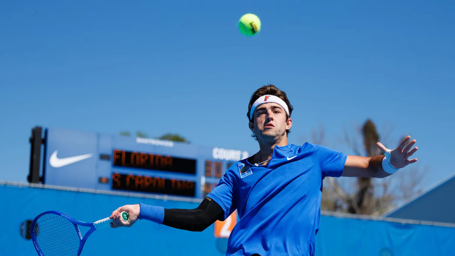 Florida Gators tennis player Pablo Perez Ramos jumps to hit the ball during an NCAA tennis match against South Carolina, Sunday, March. 1, 2026, in Gainesville, Fla.