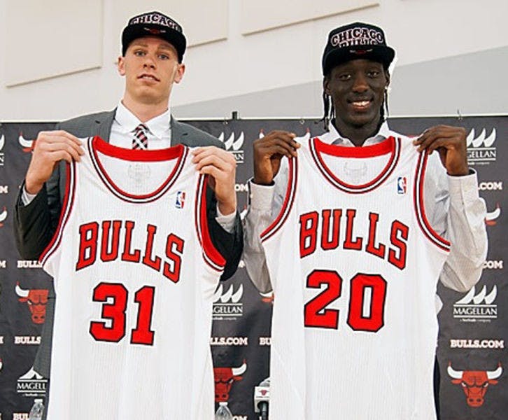 Former UF forward Erik Murphy (left) and Tony Snell pose during a Chicago Bulls’ press conference on Monday. Chicago selected both players in the NBA Draft on Thursday.