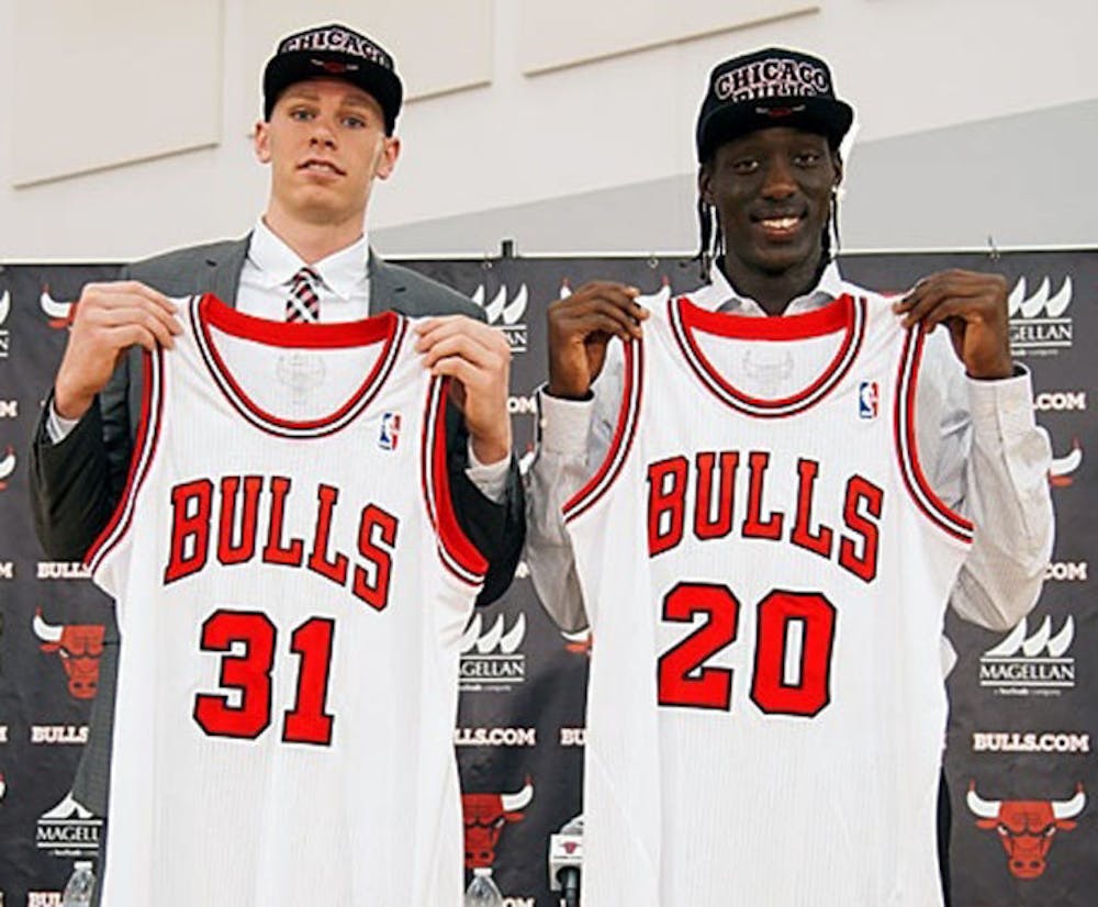 <p>Former UF forward Erik Murphy (left) and Tony Snell pose during a Chicago Bulls’ press conference on Monday. Chicago selected both players in the NBA Draft on Thursday.</p>