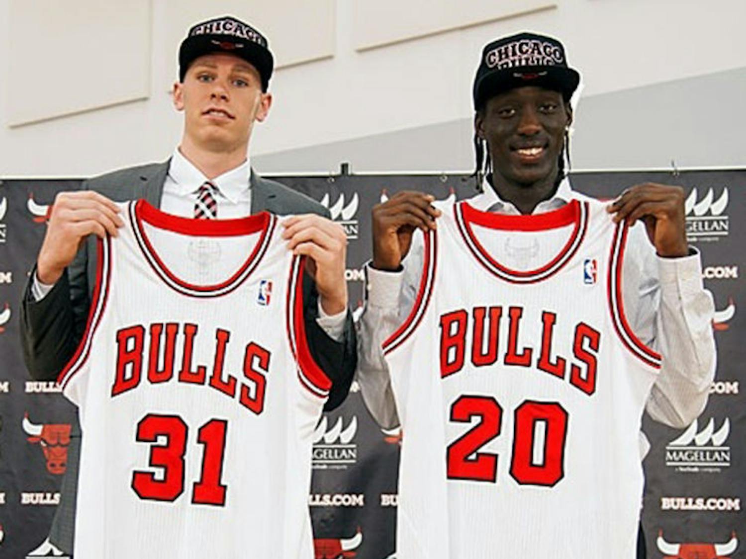 Former UF forward Erik Murphy (left) and Tony Snell pose during a Chicago Bulls’ press conference on Monday. Chicago selected both players in the NBA Draft on Thursday.
