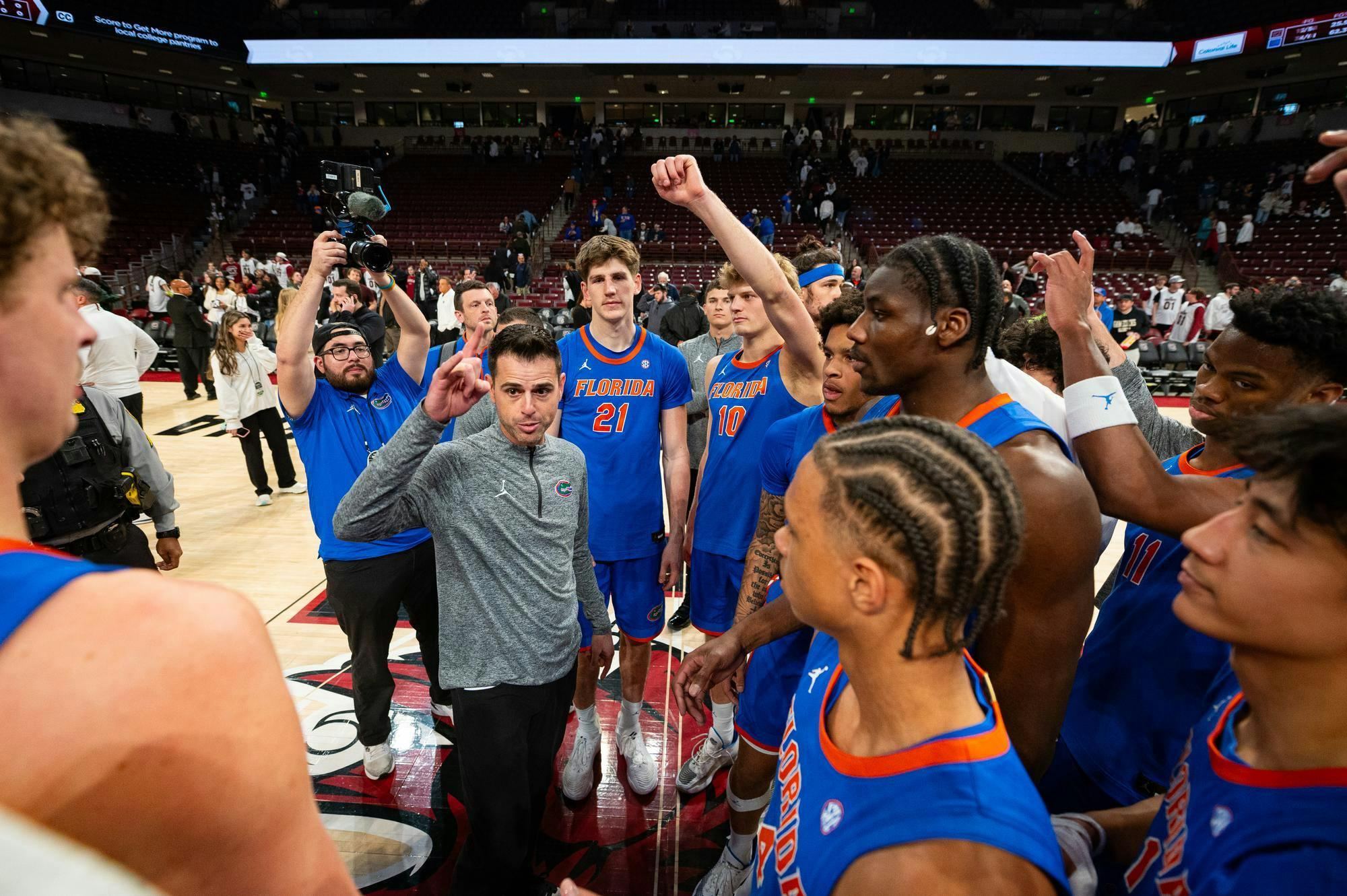 Florida head coach Todd Golden leads the team huddle after a win against South Carolina, Wednesday, Jan. 28, 2026, in Columbia, S.C.
