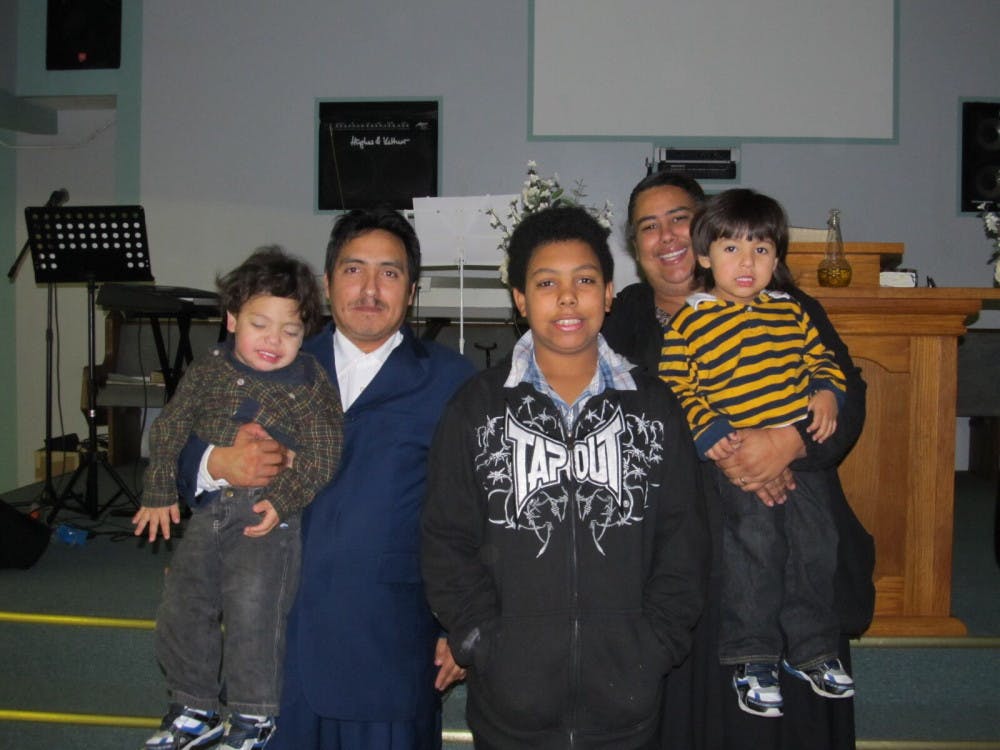The Flores-Colondres family poses for a photo at an Alabama church in 2010.