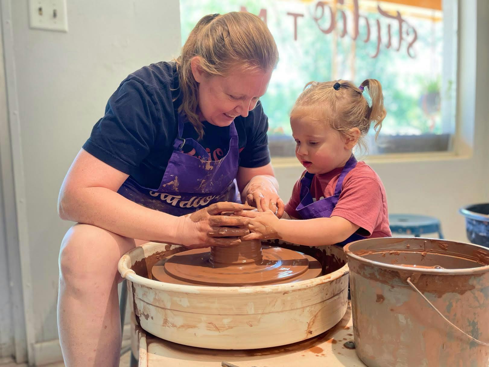 Owners of Studio TM Ceramics Sara Truman and Naomi Mostkoff said their daughter Hazel started hanging out around the shop, where she &quot;likes getting her hands dirty,&quot; according to Mostkoff. (Courtesy to the Alligator)