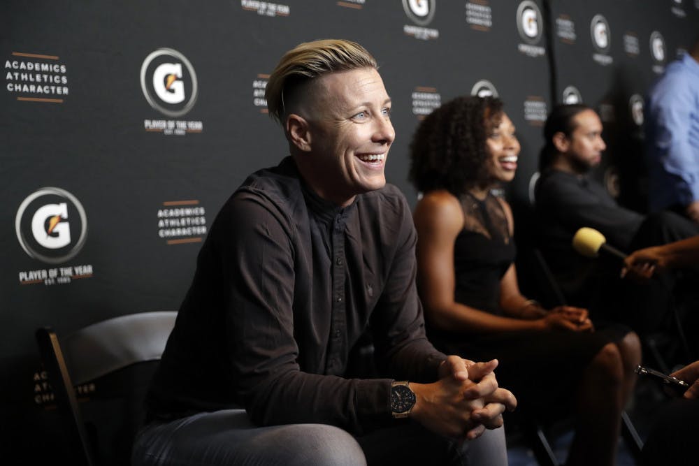 Abby Wambach (left) played for UF from 1998 to 2001, where she won a national championship and four consecutive SEC Championships. 
