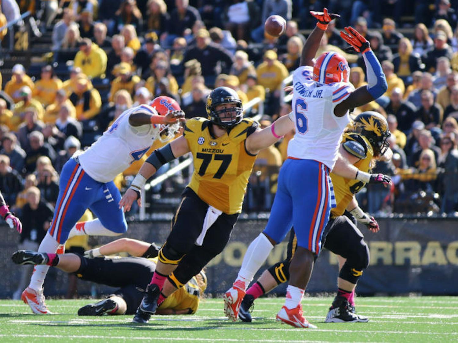 Dante Fowler Jr. (6) attempts to block a pass during Florida’s 36-17 loss to Missouri on Saturday at Faurot Field in Columbia, Mo. Tigers quarterback Maty Mauk threw for a career-high 295 yards during the game to help Missouri accumulate 500 yards of total offense — the most UF has allowed under coach Will Muschamp.