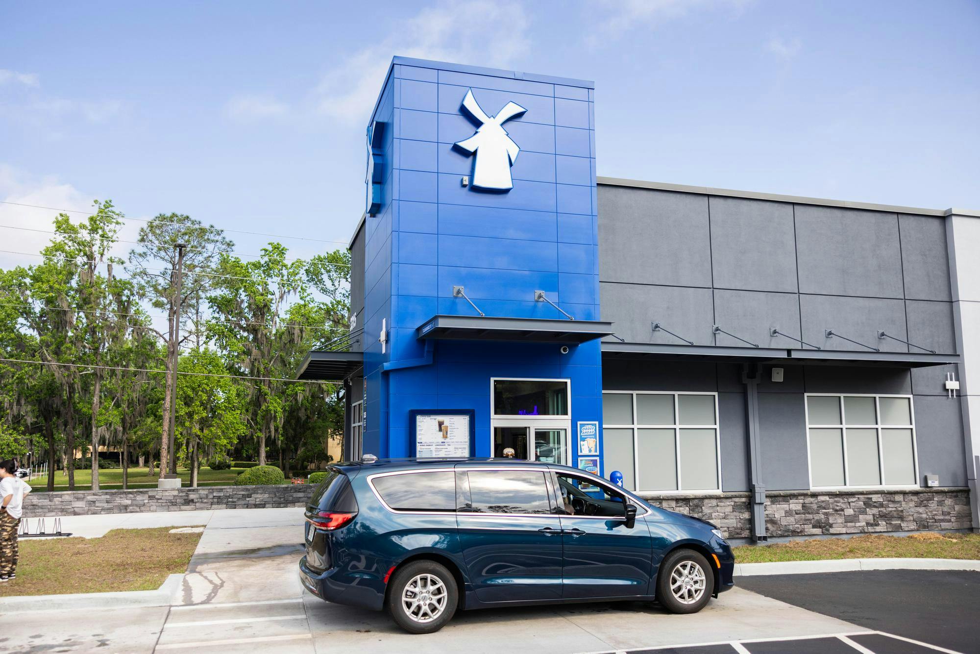 Customers enjoy the newly opened Dutch Bros Coffee on Wednesday, April 2nd, 2025.