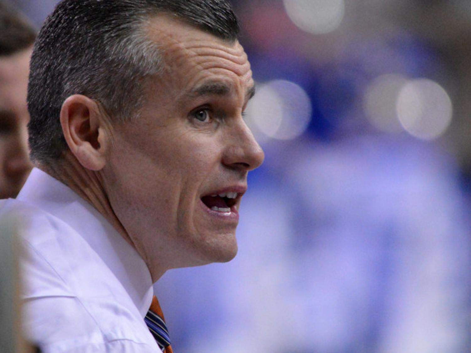 Billy Donovan talks to his players during a timeout in Florida’s 61-60 win against Kentucky on March 16 in the Georgia Dome in Atlanta.
