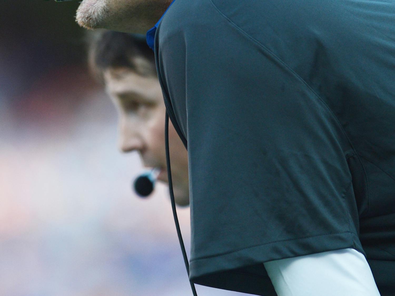 Defensive Coordinator Dan Quinn watches with excitement during Saturdays win against Bowling Green University.
