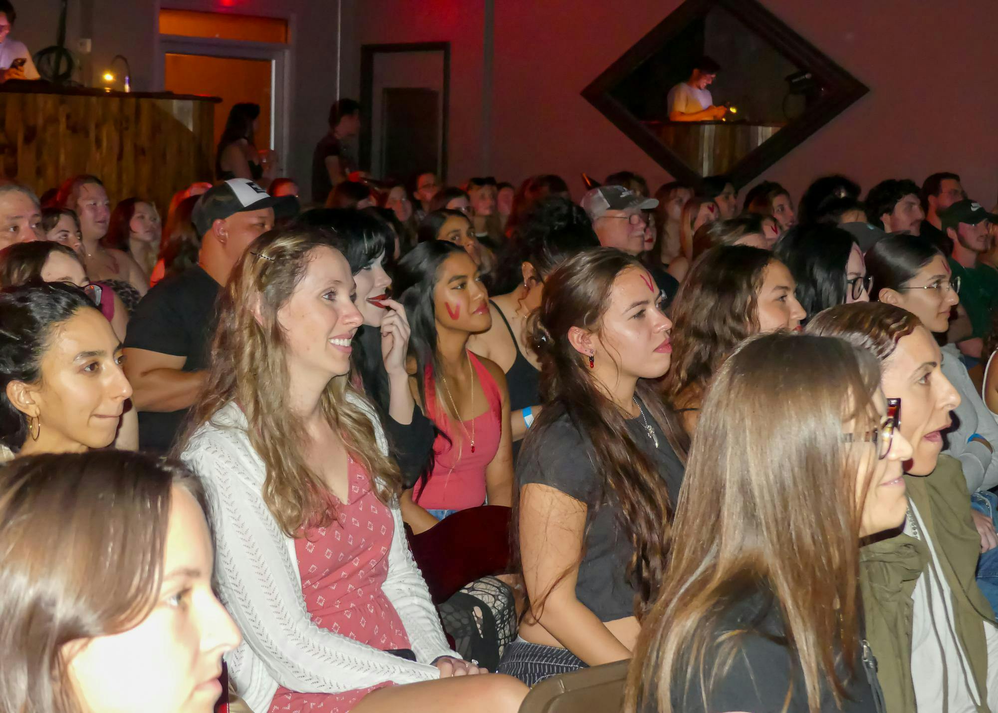 Audience members at The Wooly cheer for the cast during Glory Days’ performance of "The Rocky Horror Picture Show" on Thursday, Oct. 9, 2025.