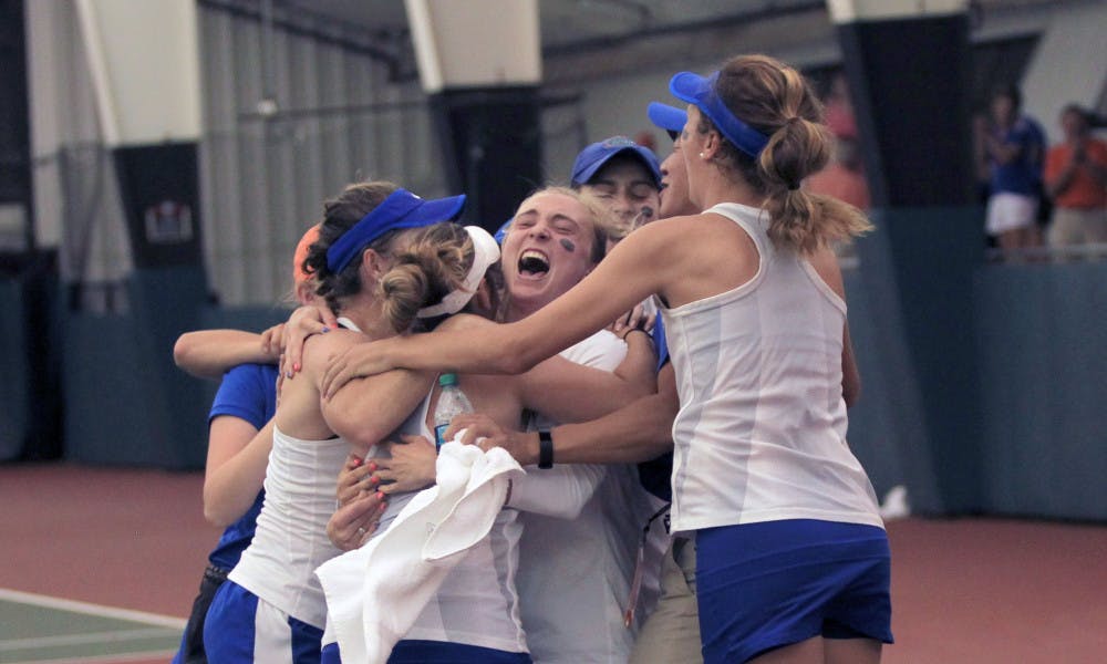 Florida celebrates after its 4-2 win against Vanderbilt in the NCAA semifinals on Monday at the Lindsey Hopkins Indoor Courts in Athens, Georgia.