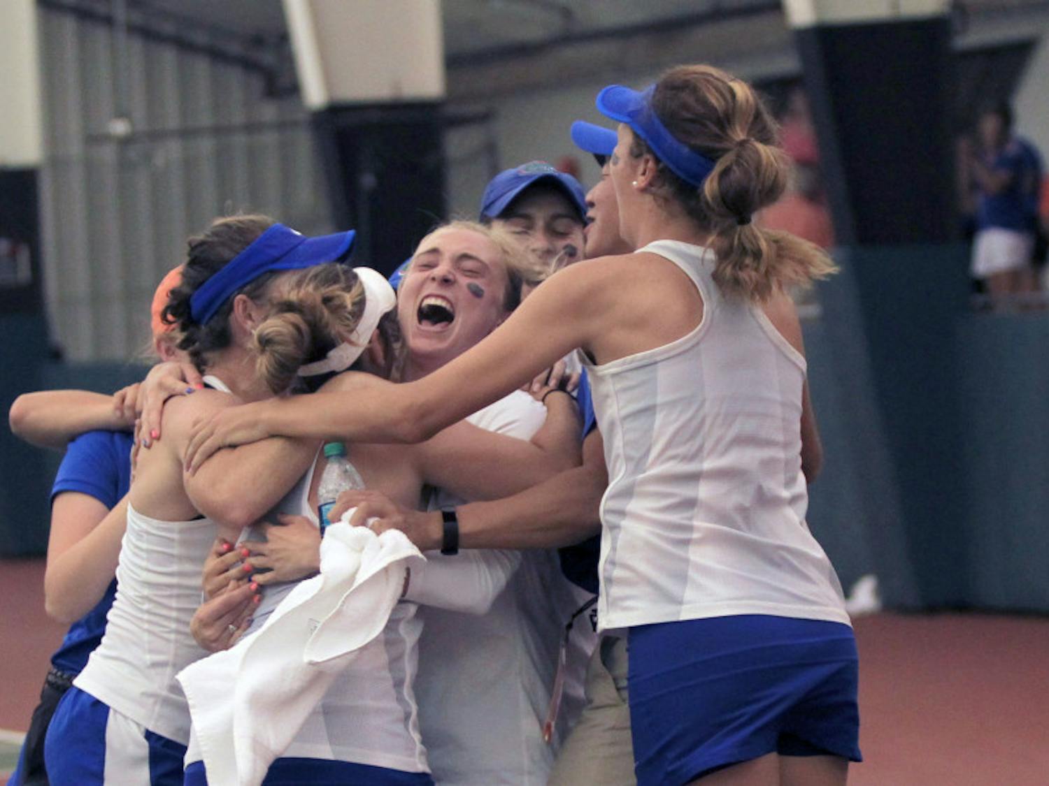 Florida celebrates after its 4-2 win against Vanderbilt in the NCAA semifinals on Monday at the Lindsey Hopkins Indoor Courts in Athens, Georgia.