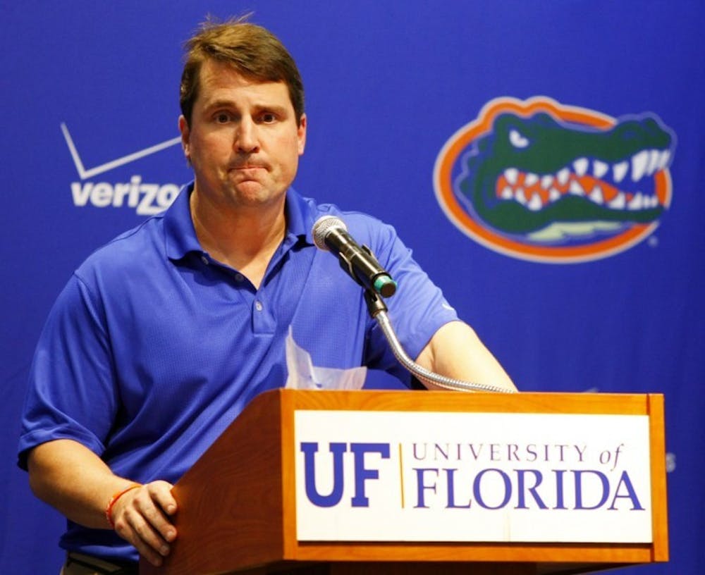 <p align="justify">Florida football coach Will Muschamp talks to reporters during UF Media Day Aug. 2. During his first year with the Gators, Muschamp led Florida to a 7-6 record and a Gator Bowl win against Ohio State.</p>