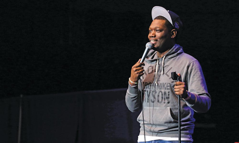 <p dir="ltr">Michael Che, a cast member of “<span class="aBn" data-term="goog_1513137718"><span class="aQJ">Saturday</span></span> Night Live,” performs stand-up comedy at UF’s O’Connell Center <span class="aBn" data-term="goog_1513137719"><span class="aQJ">on Wednesday</span></span> night. Che and fellow cast member Kenan Thompson were paid $100,000 for the show, hosted by the Accent Speakers Bureau.</p>