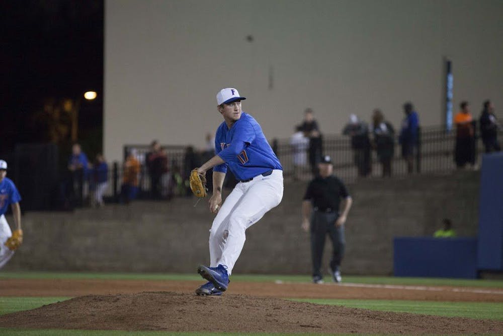 <p>UF reliever Michael Byrne throws a pitch during Florida's 3-2 loss in 10 innings to Tennessee on April 8, 2017, at McKethan Stadium.</p>