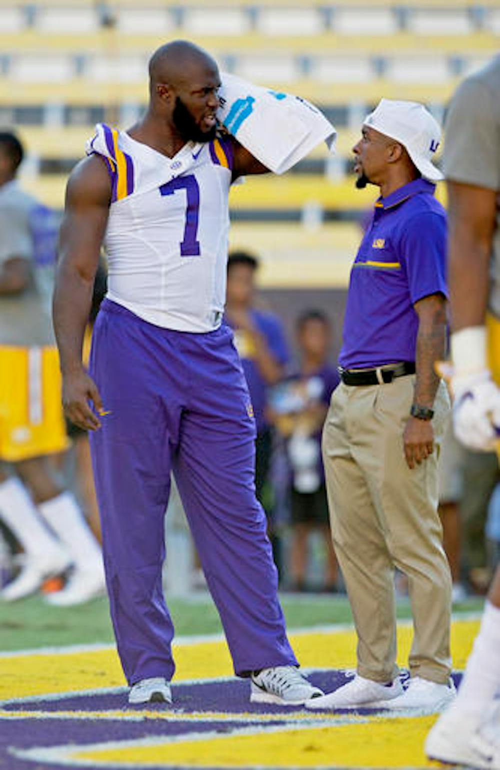 <p>Leonard Fournette (7) chats on the field before an NCAA college football game against Missouri in Baton Rouge, Louisiana, on Oct. 1, 2016.</p>