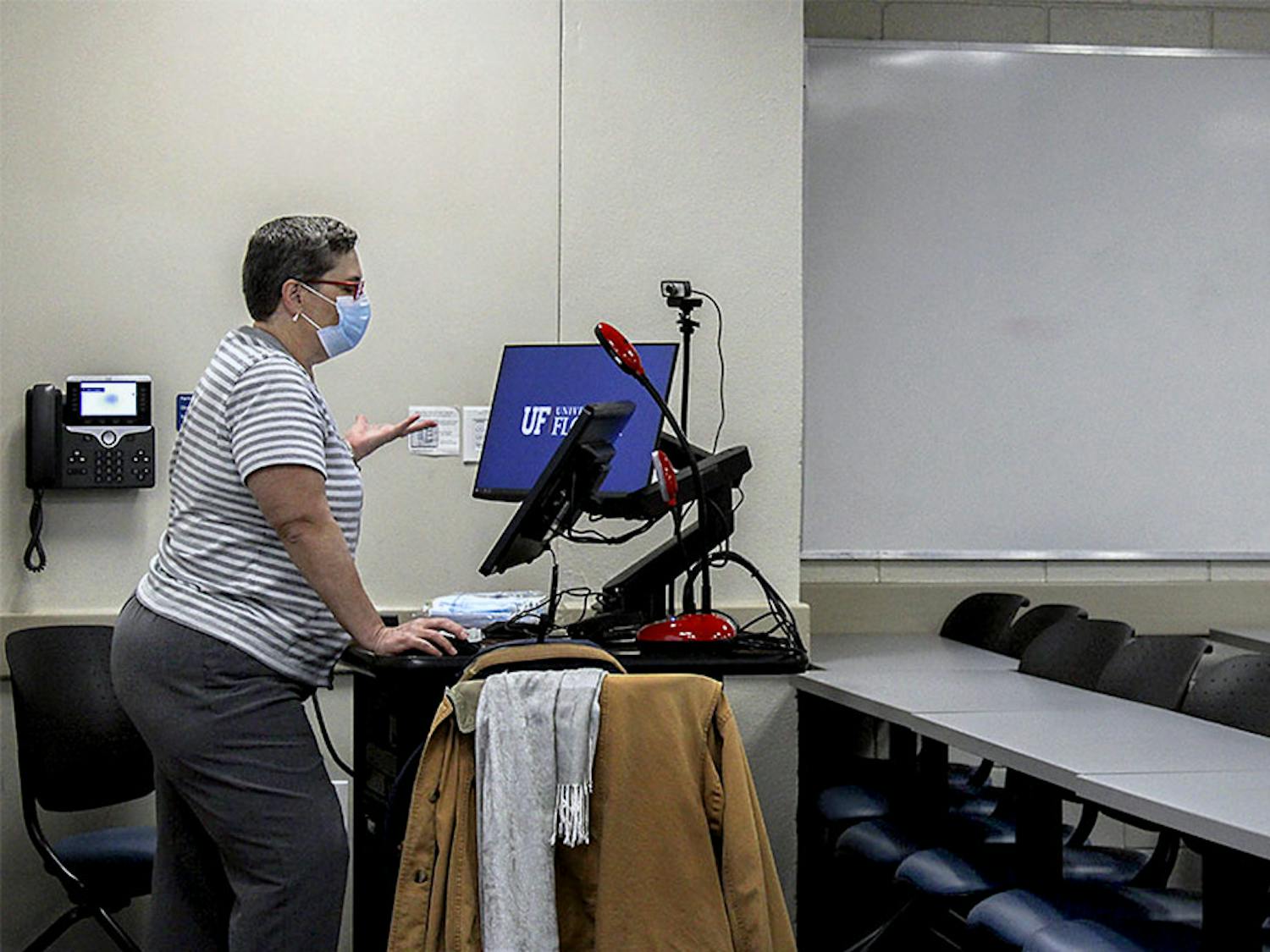 Velvet Yates, director of distance learning for the UF Classics Department, begins class in an empty classroom on Wednesday, Jan. 13, 2021. She said the university requires her to teach in the classroom even if no students show up. "It's absurd," Yates said. "I've been teaching online classes for 15 years. I know how to teach online classes, and this isn't it."
