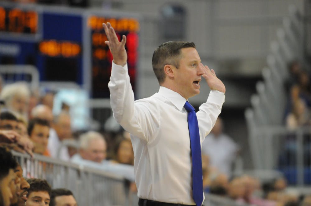 <p>UF men's basketball coach Mike White reacts after a play during the first half of Florida's 89-42 win against Palm Beach Atlantic in an exhibition game Nov. 5, 2015, in the O'Connell Center.</p>