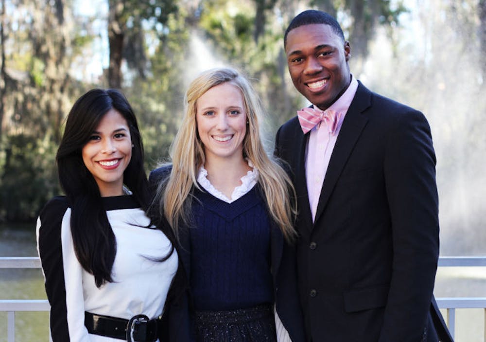 <p>Swamp Party vice presidential candidate Joselyn Rivas stands with the party’s presidential candidate Christina Bonarrigo and treasurer candidate Jayce Victor.</p>