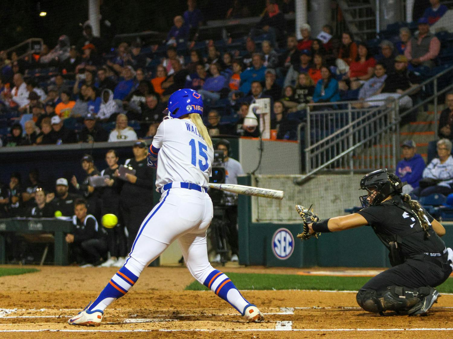 Florida infielder Reagan Walsh swings her bat during the Gators' 3-0 win against the Central Florida Knights Wednesday, March 8, 2023.