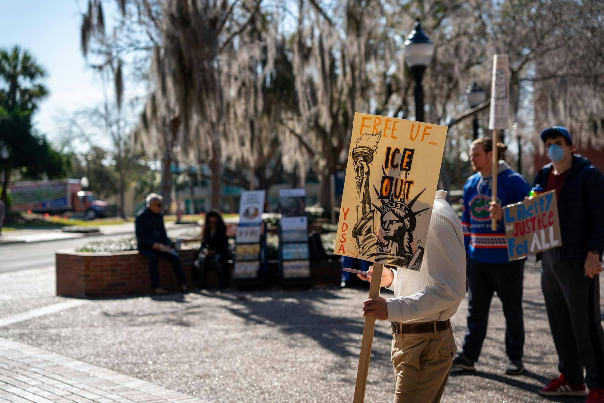 The Young Democratic Socialists of America gather with signs at Turlington Plaza in Gainesville, Fla. Friday, Jan 30, 2026.