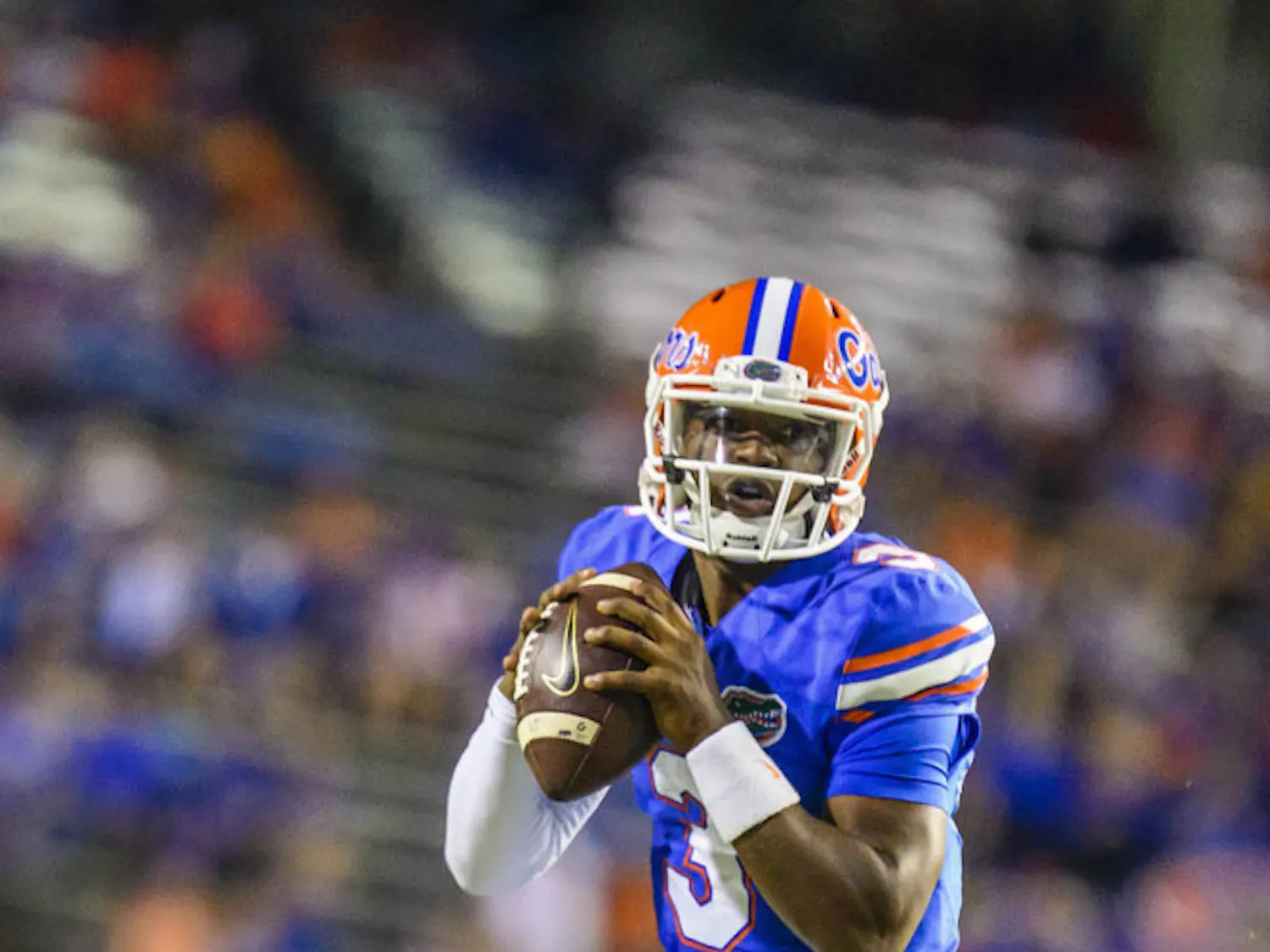 Treon Harris looks downfield for a receiver during Florida's 42-13 loss to Missouri on Oct. 18 at Ben Hill Griffin Stadium.