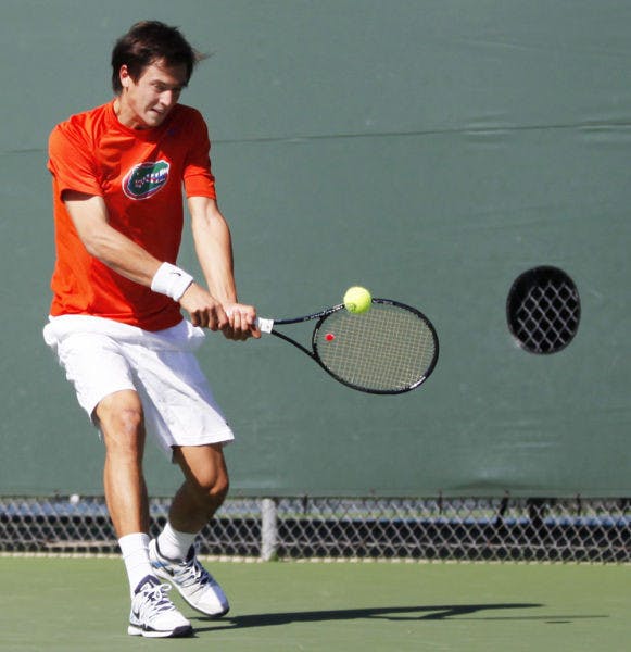 Junior Florent Diep strikes the ball during Florida’s 5-2 victory against Miami on Jan. 19 at Linder Stadium.