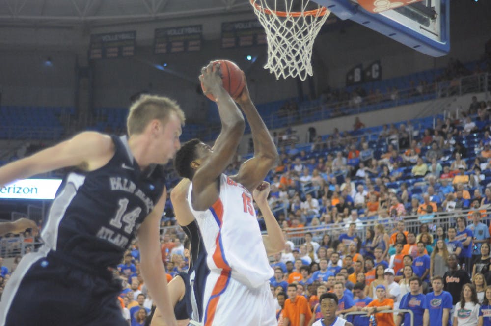 <p>UF center John Egbunu goes up for a dunk during Florida's 89-42 win against Palm Beach Atlantic in an exhibition game on Nov. 5, 2015, in the O'Connell Center.</p>
