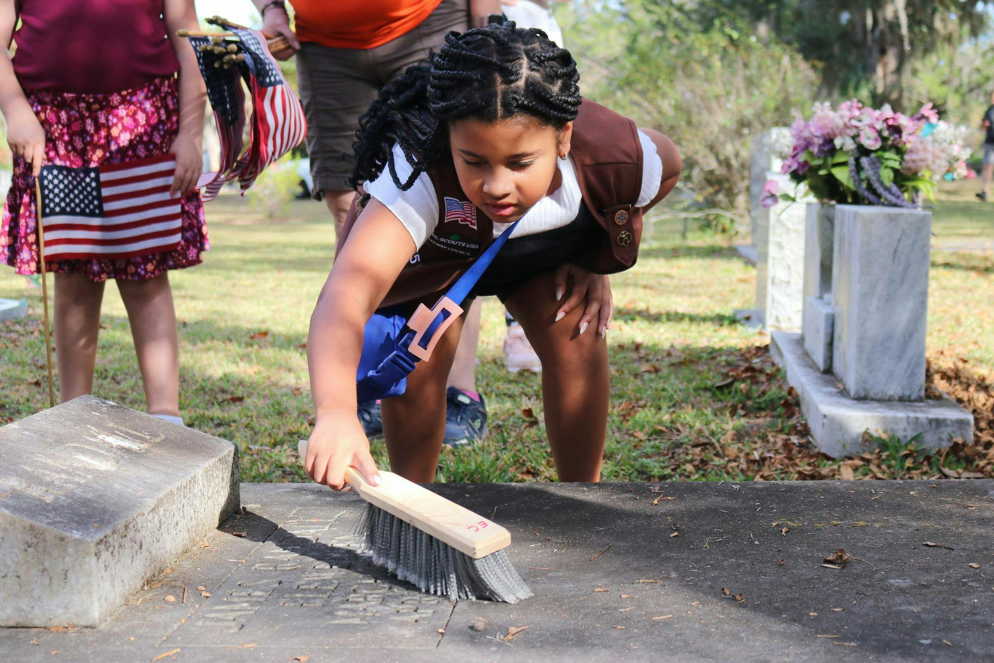 Local Girl Scouts honored the upcoming Veteran's Day holiday by placing American flags along Evergreen Cemetery on the morning of Nov. 8, 2025.