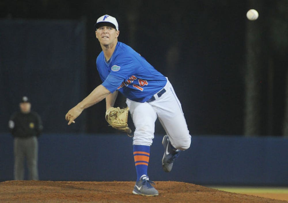 <p>Bobby Poyner pitches during Florida’s 2-1 win against Arkansas on March 15, 2014 at McKethan Stadium.</p>