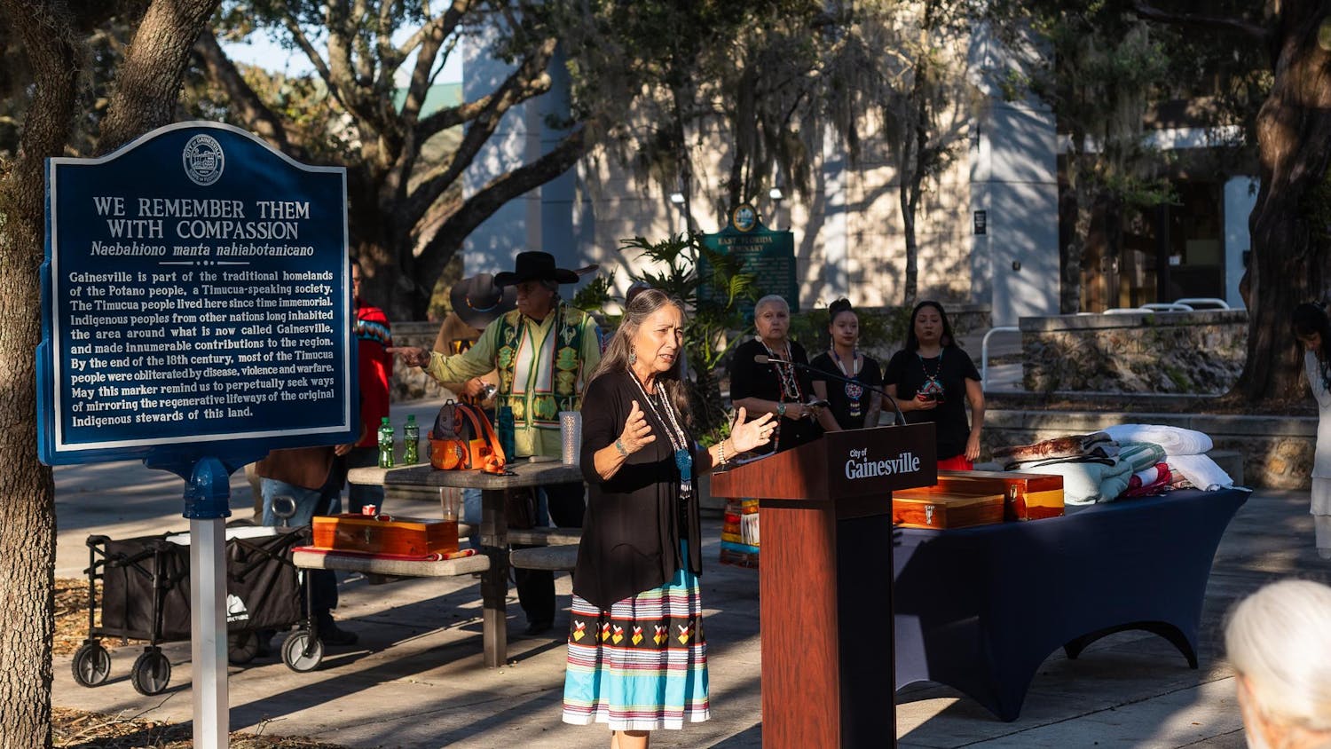 A woman celebrates Indigenous Peoples’ Day at the City Hall Plaza on Oct. 14, 2024.
