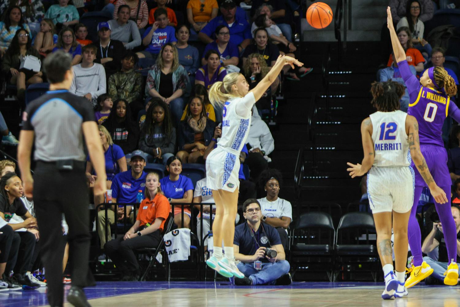Florida guard Alberte Rimdal shoots the ball over a defender’s outstretched arm in the Gators' 90-79 loss to the Louisiana State Tigers Sunday, Feb. 19, 2023.