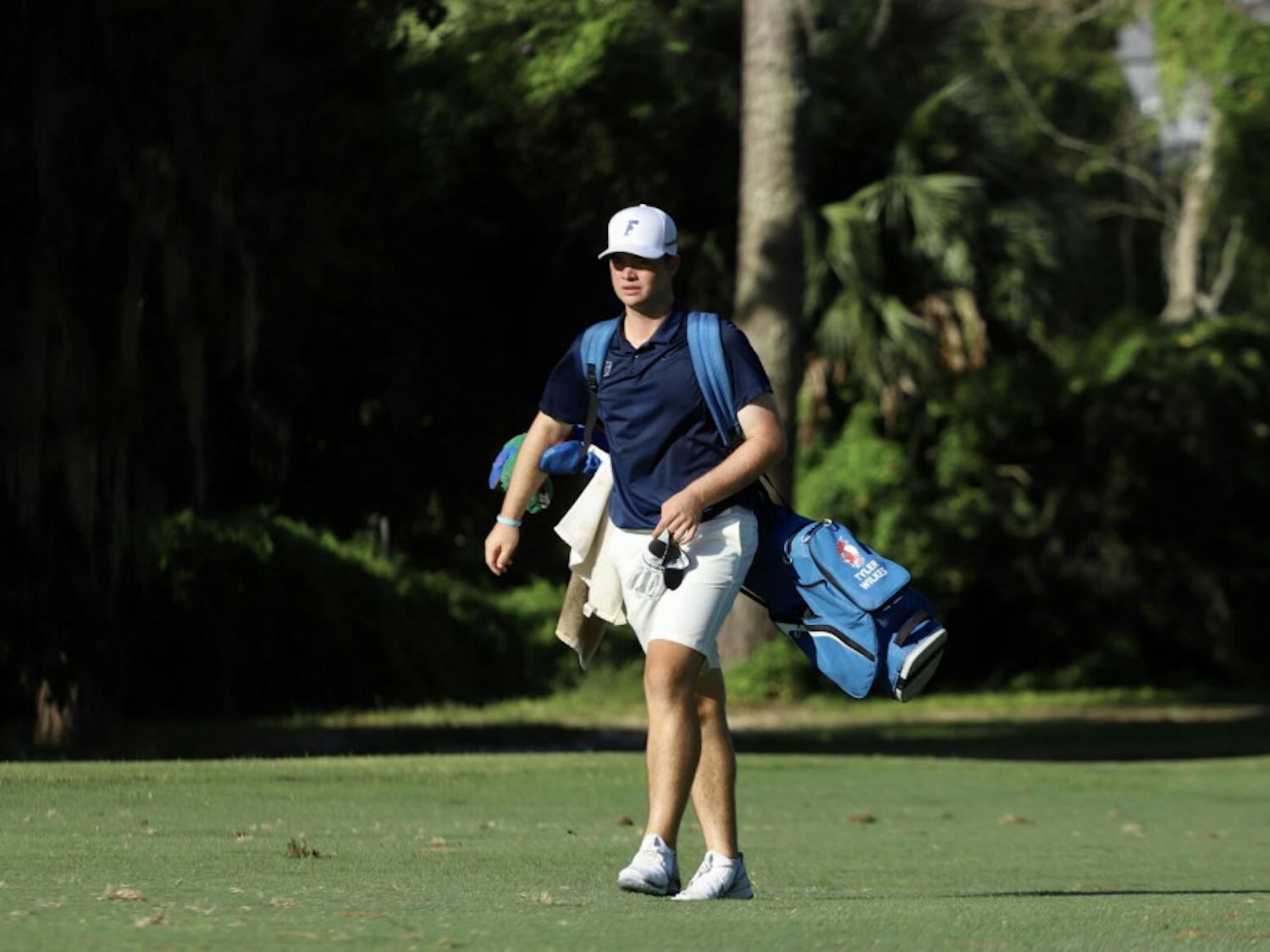Freshman Tyler Wilkes practices at Mark Bostick Golf Course.
