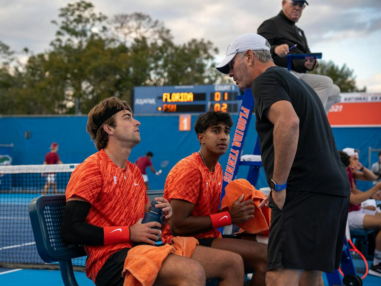 Florida’s men’s tennis head coach Adam Steinberg addresses players during an NCAA men's doubles tennis match against Florida State in Gainesville, Fla., Friday, Jan 30, 2026.