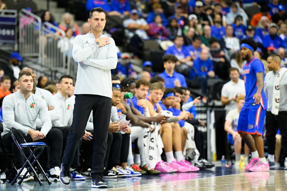 Florida head coach Todd Golden watches his team during the first half of an NCAA men's basketball exhibition game against Baylor, Sunday, Oct. 18, 2026, in Jacksonville, Fla.